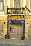 Virágdíszben