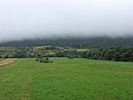 Ködbe vesző hegyek